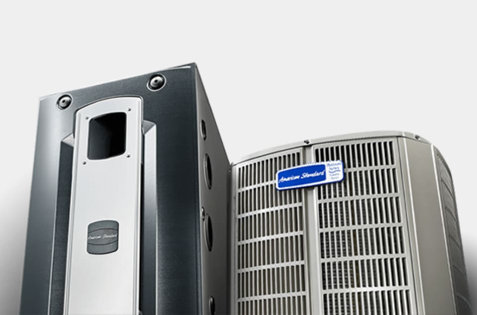 A close up of an air conditioner and a cell phone